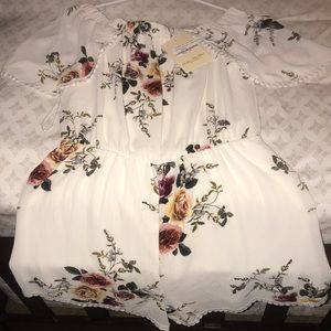 Floral off the shoulder romper.